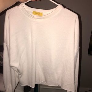 Cropped white sweater from Charlotte Russe